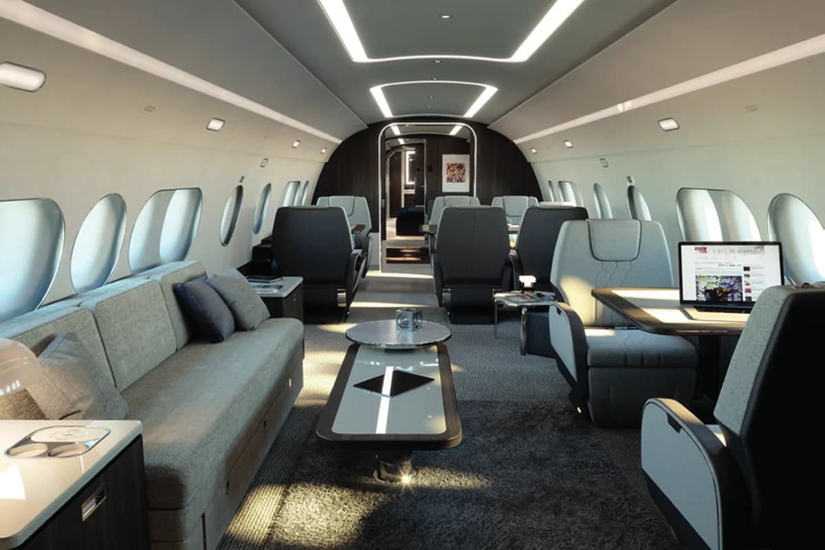 ACJ TwoTwenty 9H-FIVE aft lounge with 55-inch screen