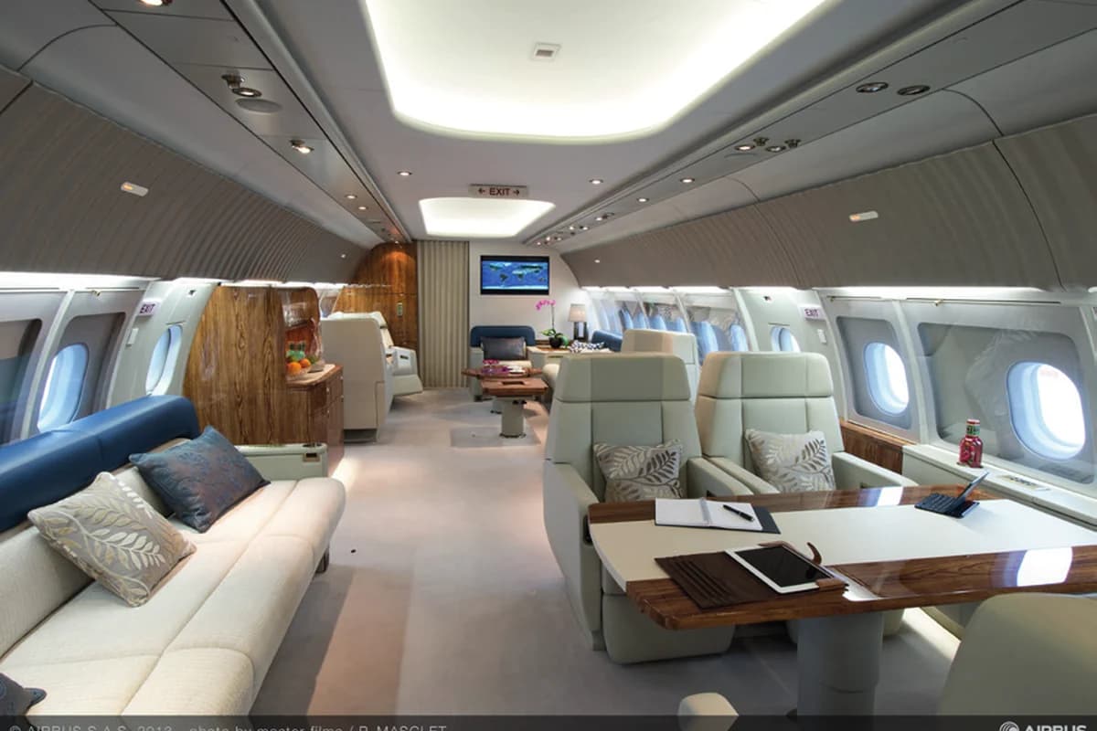 ACJ318 9H-BDONE forward lounge with club seats and screen