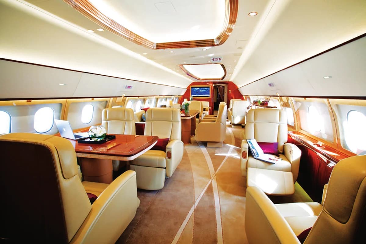 ACJ319 9H-TBN forward cabin: club seats and work table