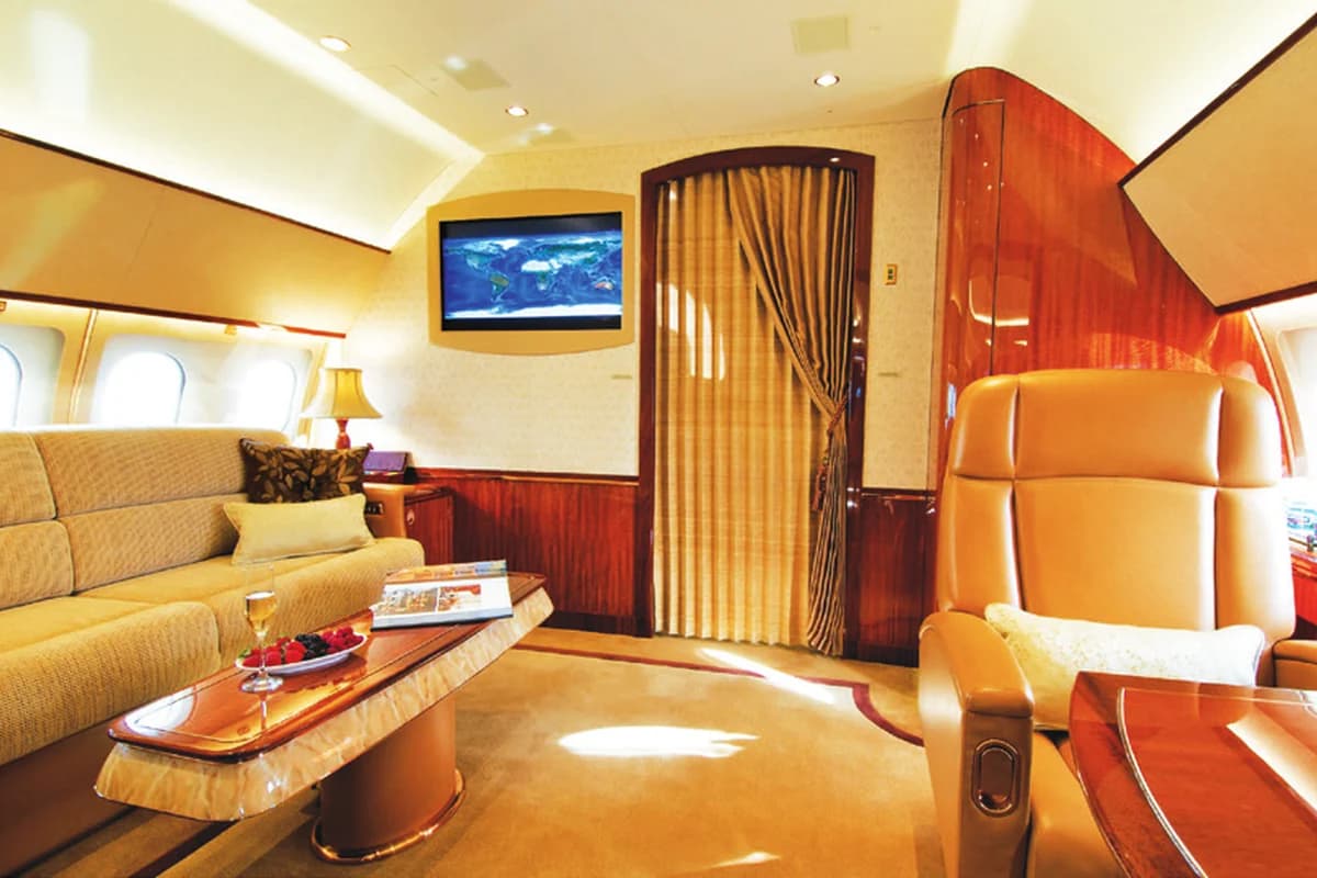 ACJ319 9H-TBN lounge looking aft to the private suite door