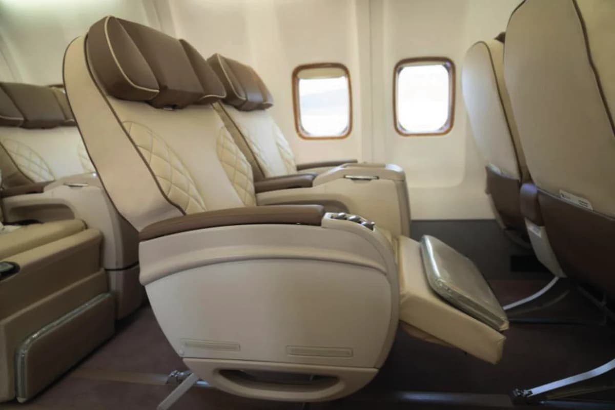 737-500 BBJ 9H-MAC leather seat by the window