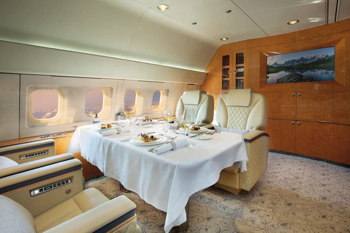 BBJ 767 P4-CLA dining room with table set for a meal
