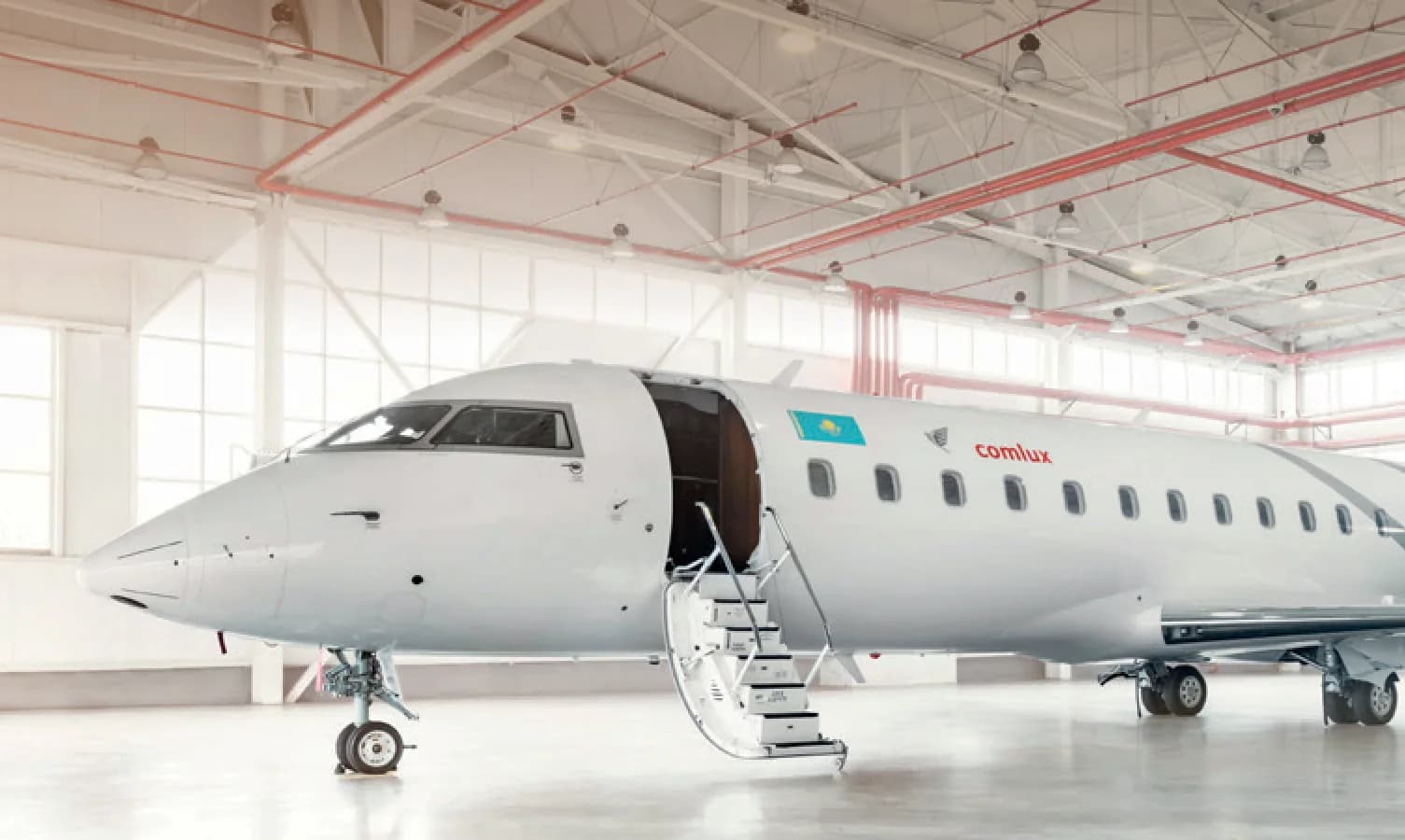 Bombardier Challenger 850 UP-C8505 in the hangar with airstairs down