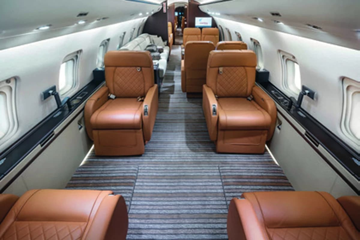 Challenger 850 UP-C8505 cabin with tan leather club seats