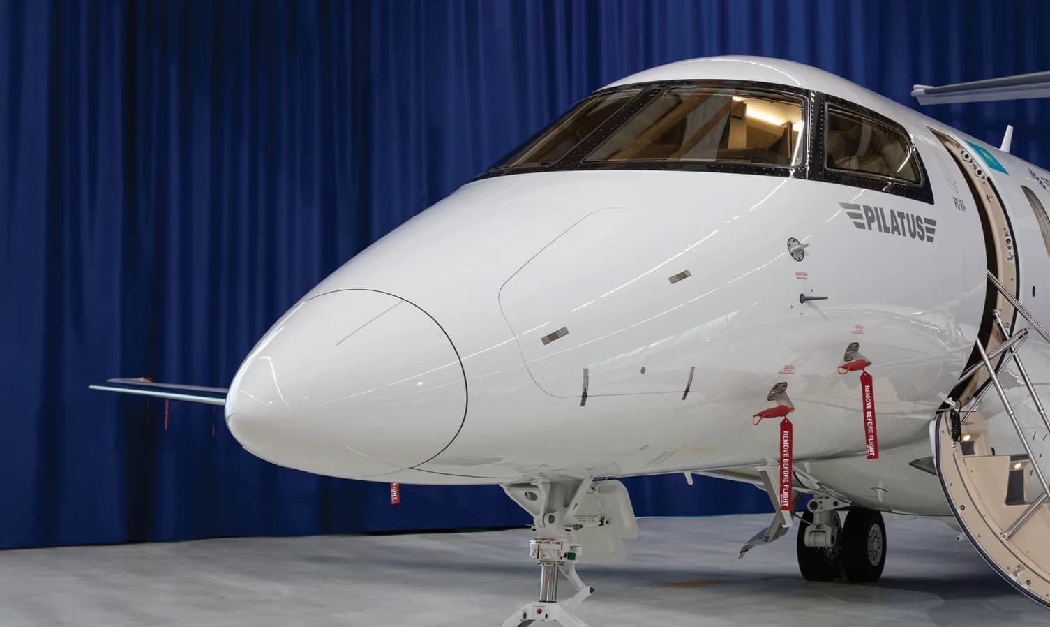 Pilatus PC-24 UP-PC002 in the hangar